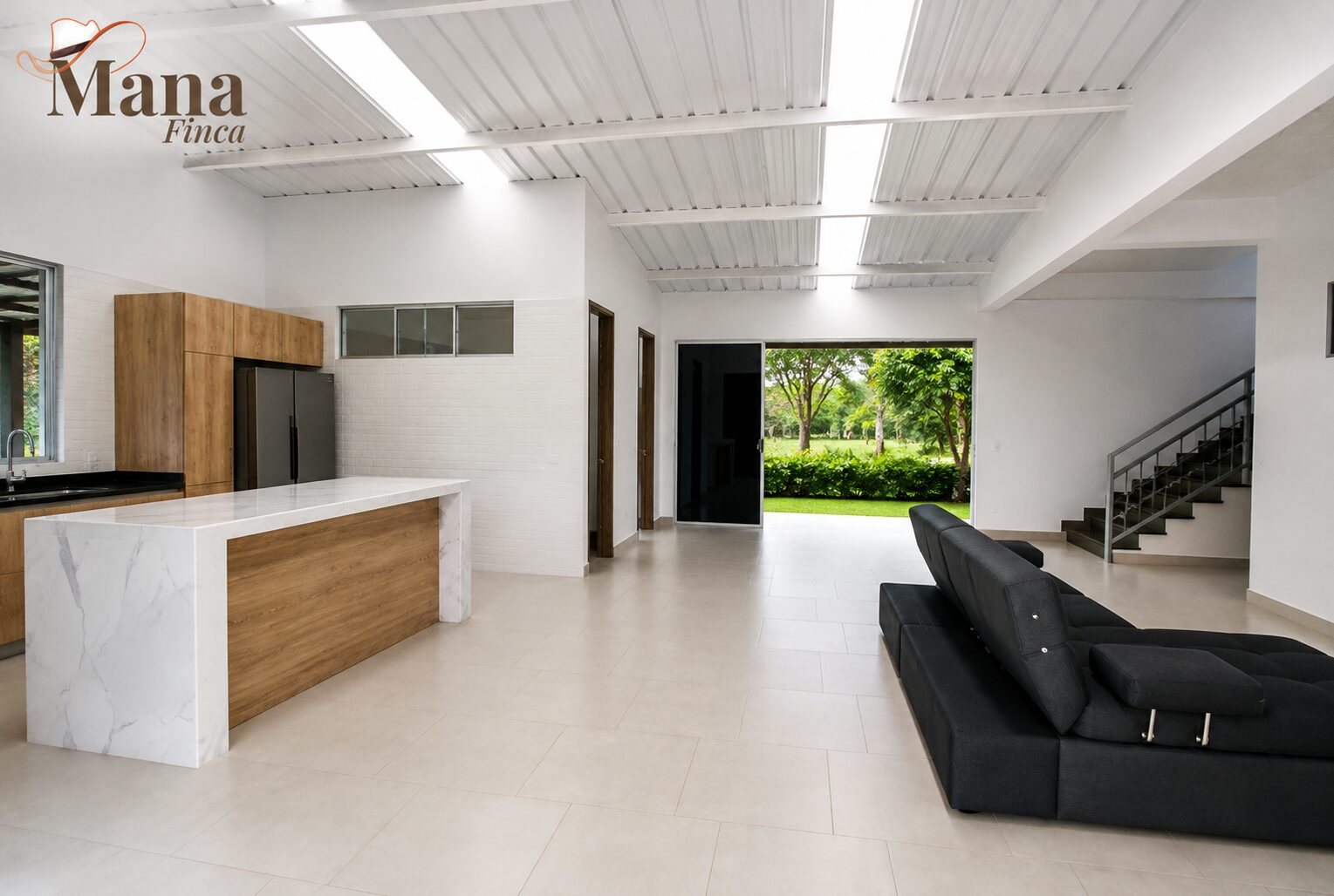 Sala y cocina abiertas de Finca Mana